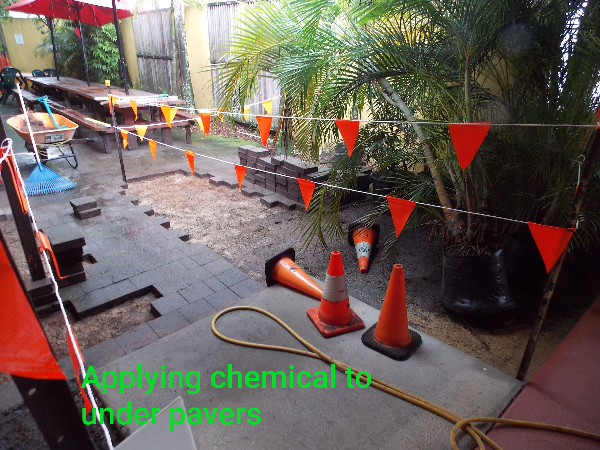 Drilling holes in floor to inject termite control in cairns a major control effort.