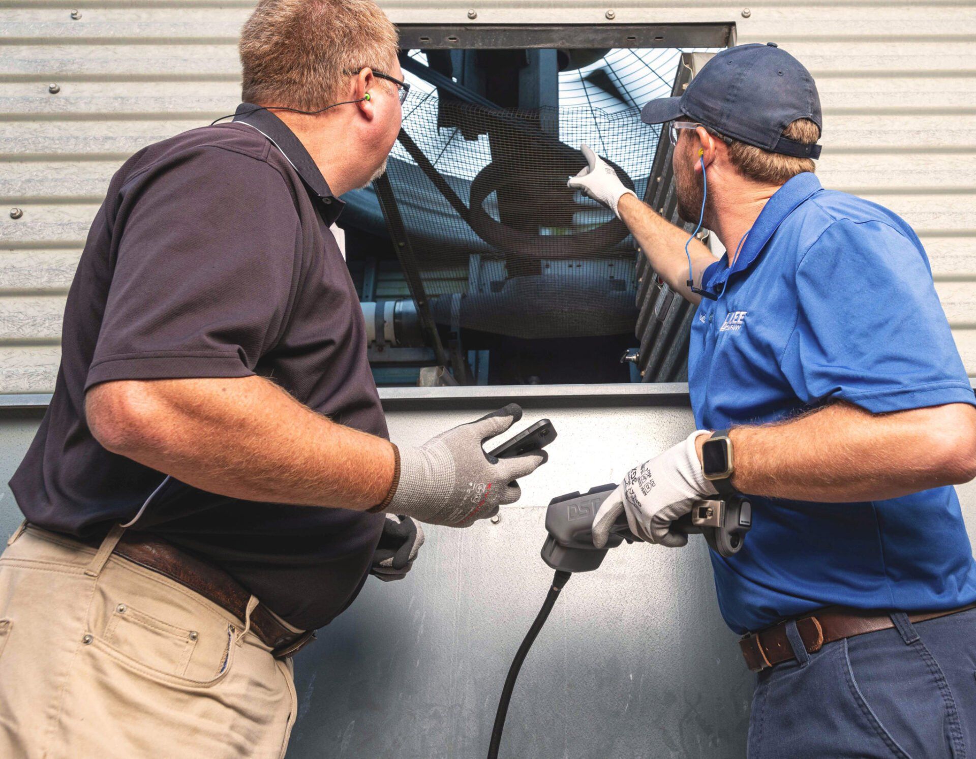 Workers inspecting - DST Electrical Fault Detection