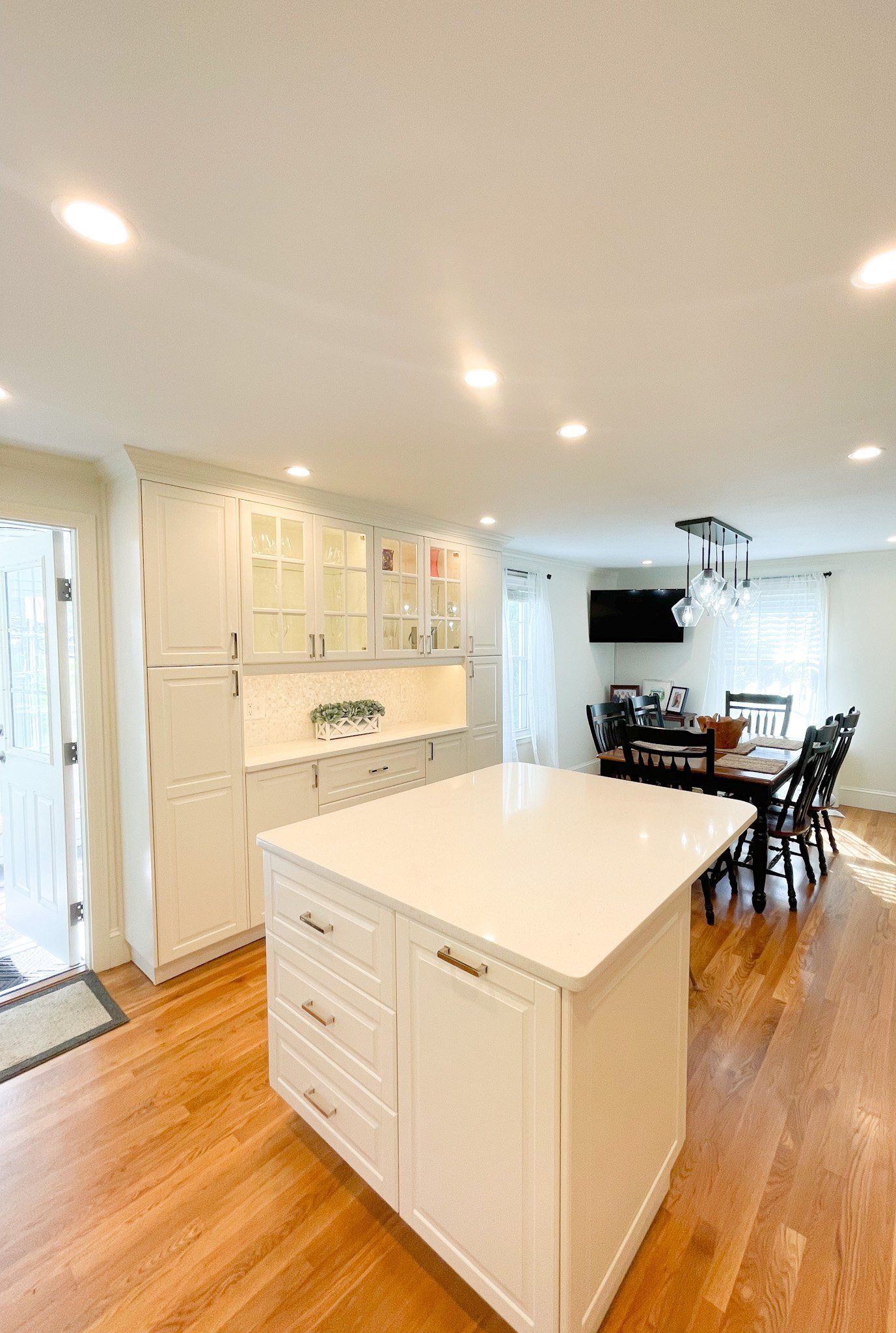 There is a large island in the middle of the kitchen.