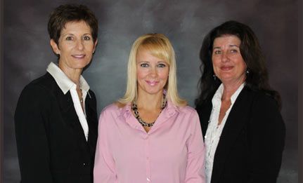 group picture of Shannon, the broker, Sylvia, the residential leasing and real estate sales professional, and Brenda, the Commercial property administrator