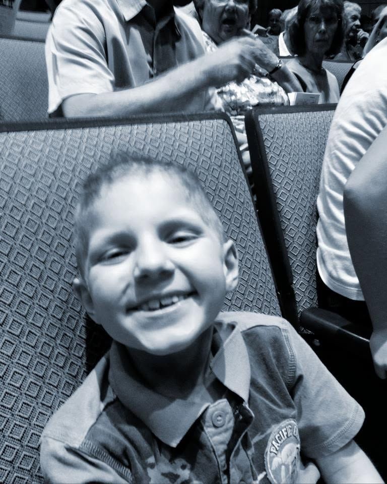 Jayden Lamb smiling during treatment, showing the comfort that caring words and support