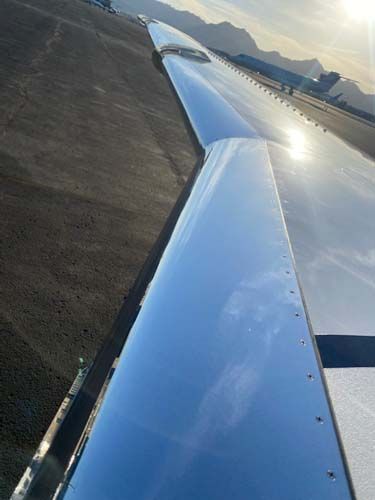 airplane trailing wing brightwork