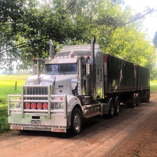 Silver Semi Truck With Black Trailer — A & S Cuthel Earthmoving & Transport in Dorrigo, NSW