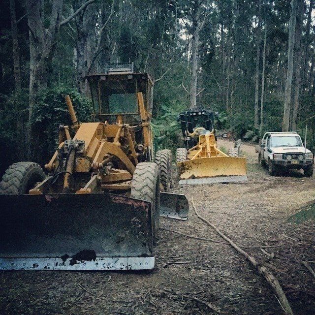 Two Yellow Construction Vehicles — A & S Cuthel Earthmoving & Transport in Dorrigo, NSW