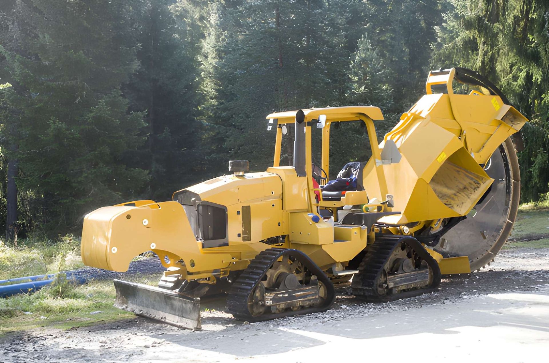 Yellow Tracked Excavator Loading Dirt — A & S Cuthel Earthmoving & Transport in Coffs Harbour, NSW