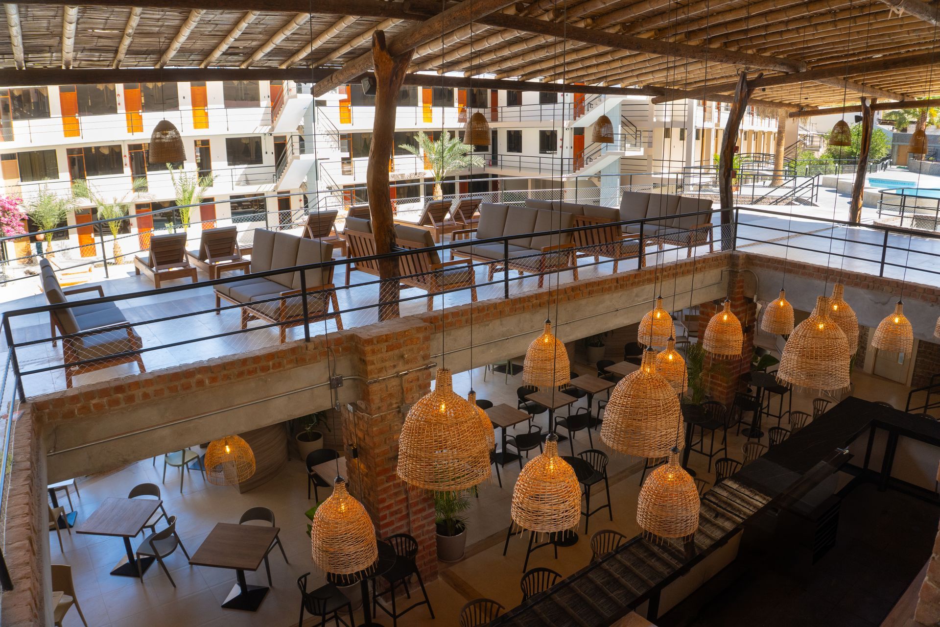 An aerial view of a restaurant with tables and chairs.