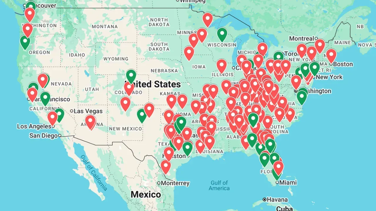 A map of the United States showing a dense cluster of red and green location pins primarily concentrated in the east.