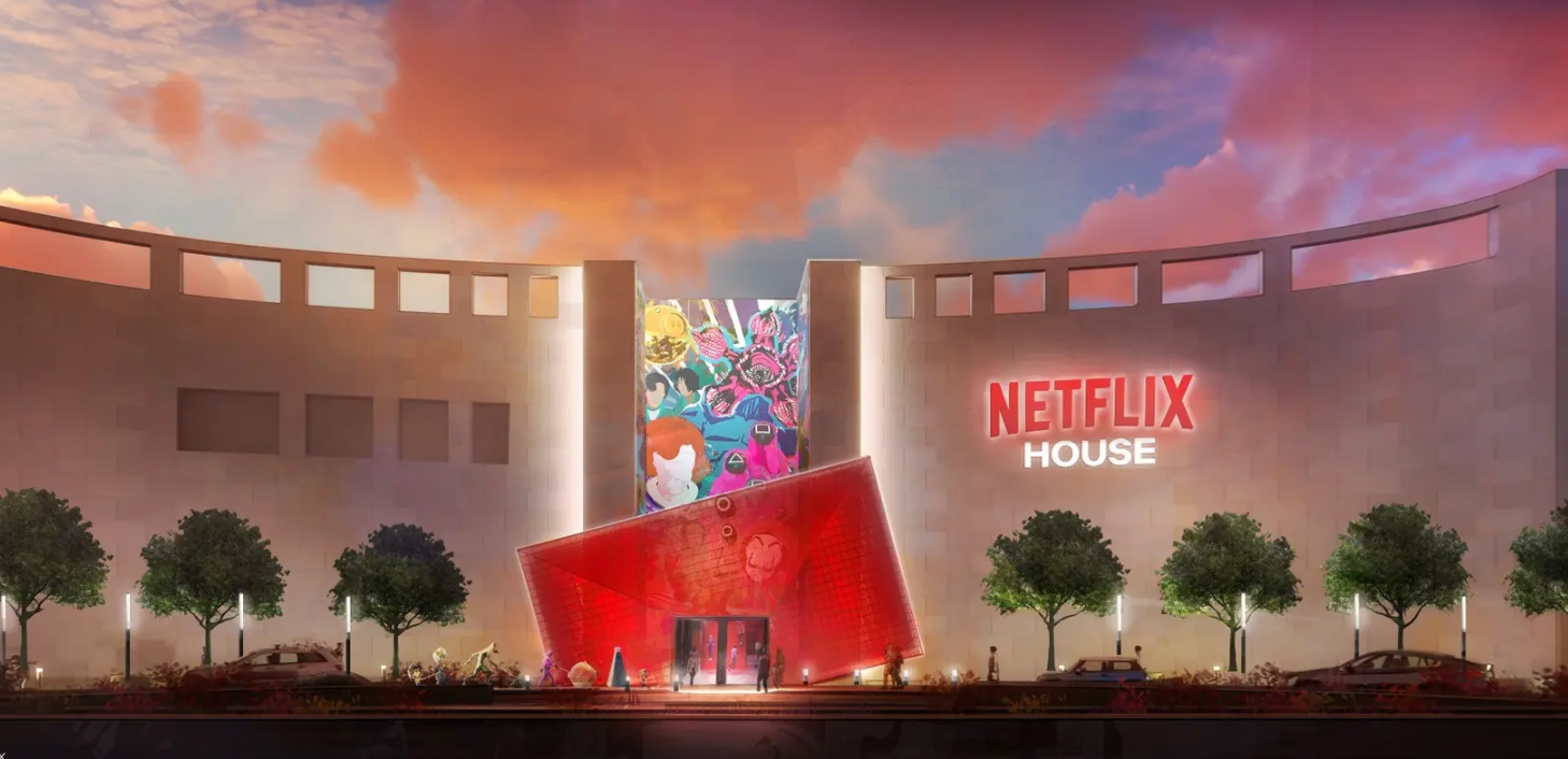 A conceptual rendering of a Netflix House entertainment venue featuring a modern curved building with a bright red entrance.