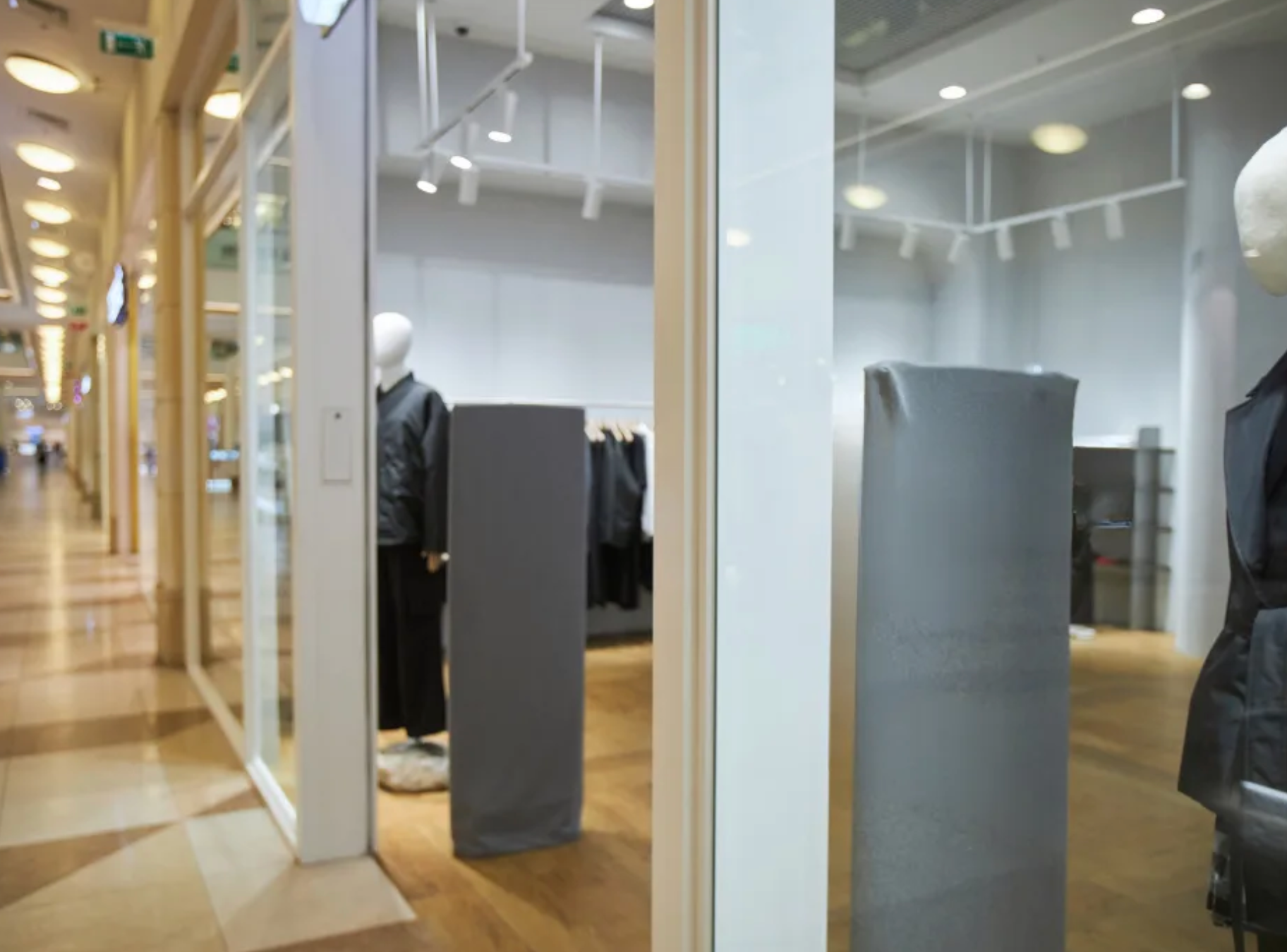 A flat, single-story retail building with a