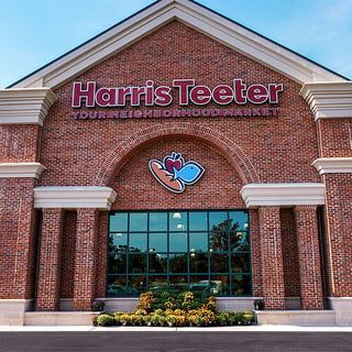 A flat, single-story retail building with a 