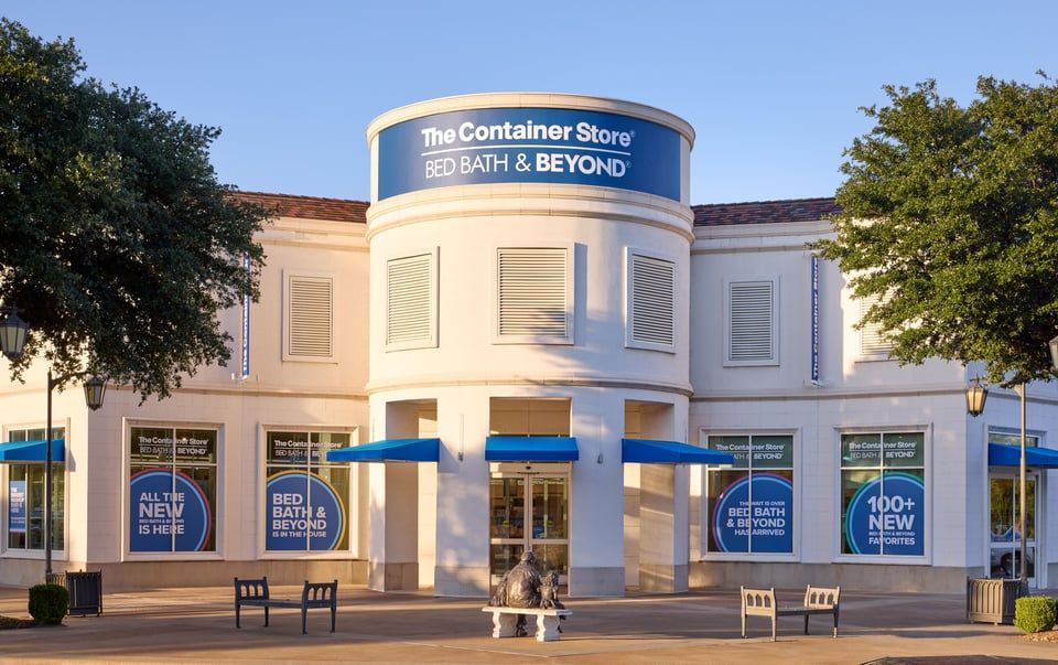 A flat, single-story retail building with a 