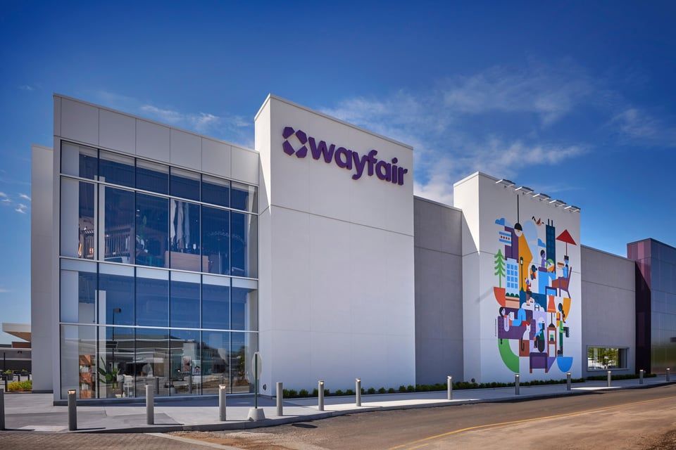 A flat, single-story retail building with a 