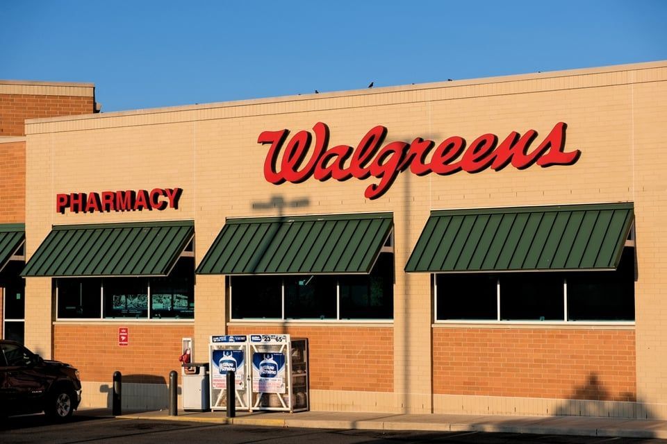 A flat, single-story retail building with a