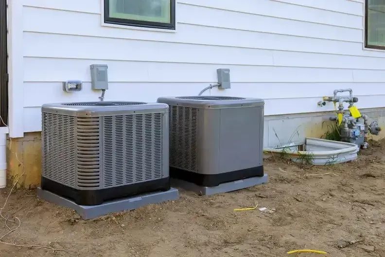 Two air conditioner systems set up for cooling services and HVAC installations in Bergen County
