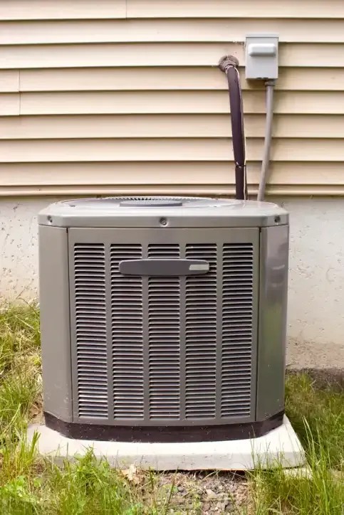 AC unit connected to home for air conditioning and electrical services in Hackensack, NJ
