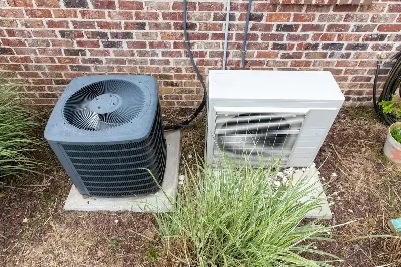 Outdoor AC condenser units showing split system setup by cooling technicians in Bergen County
