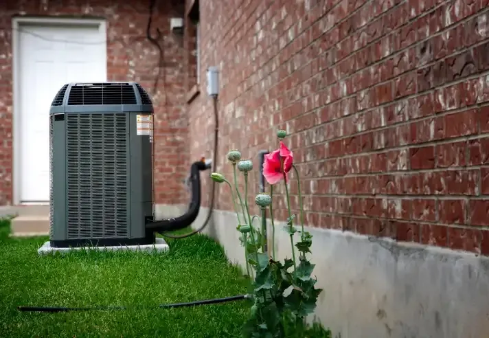 Efficient air conditioning unit placed in yard, part of residential HVAC services in Hackensack, NJ
