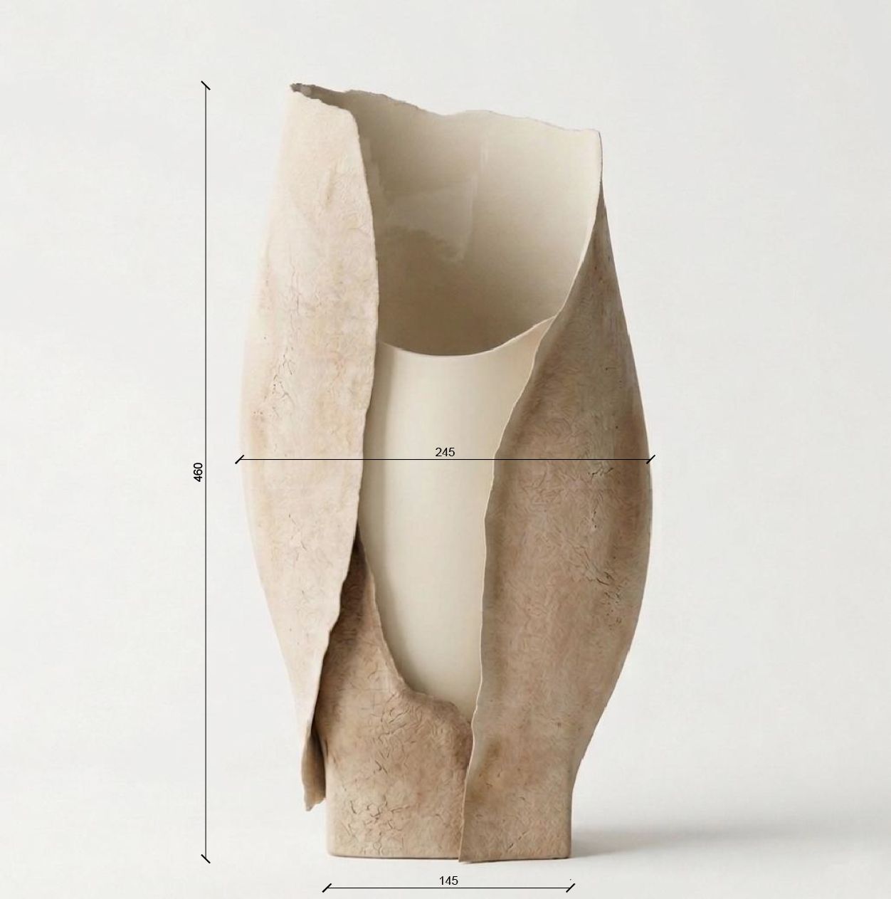Abstract beige sculpture with curved cutouts and measurement lines on a white background