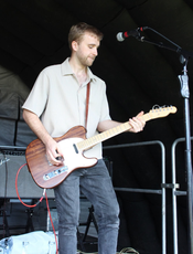Daniel White playing the guitar.