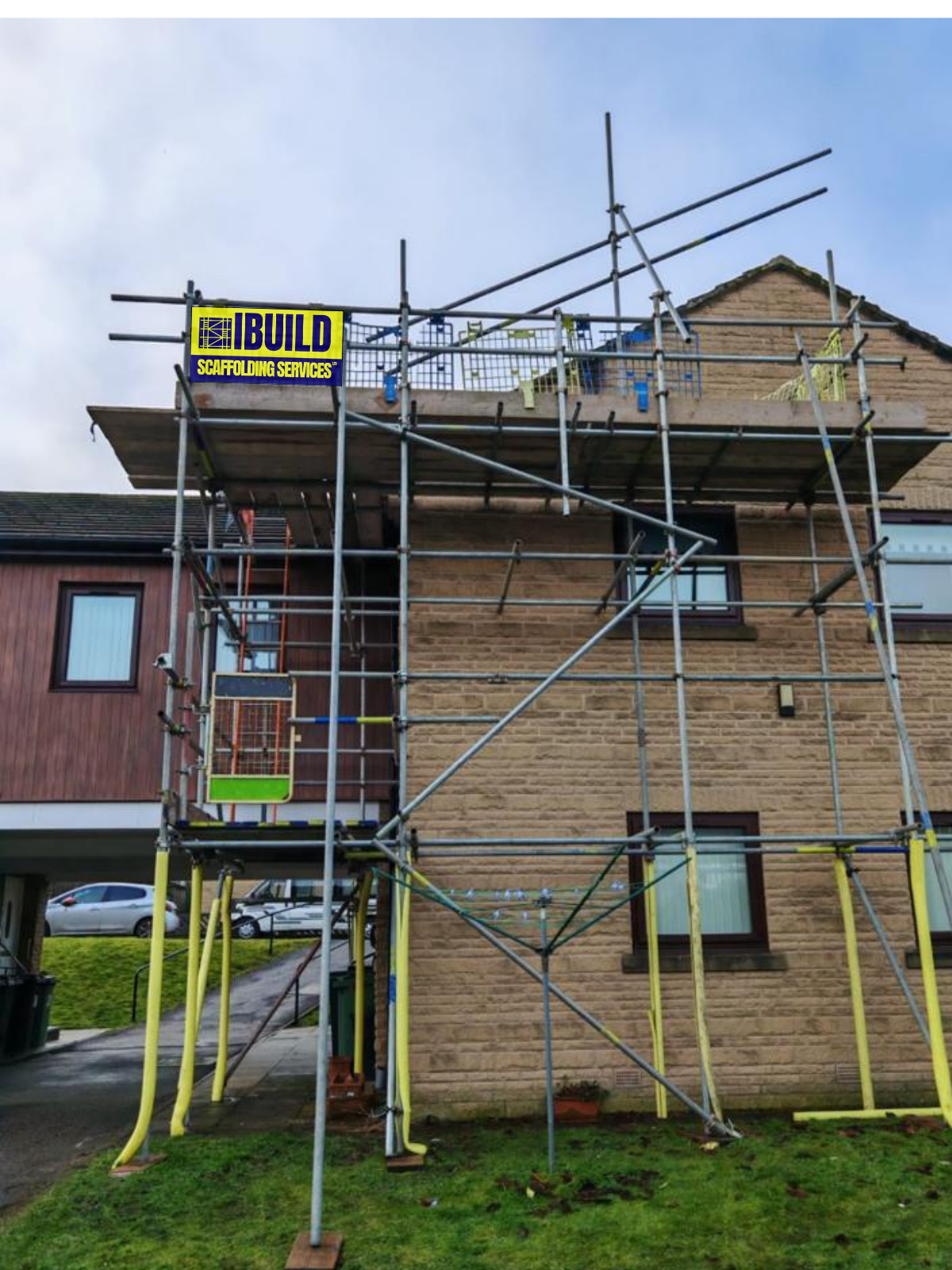 A large brick building with scaffolding around it