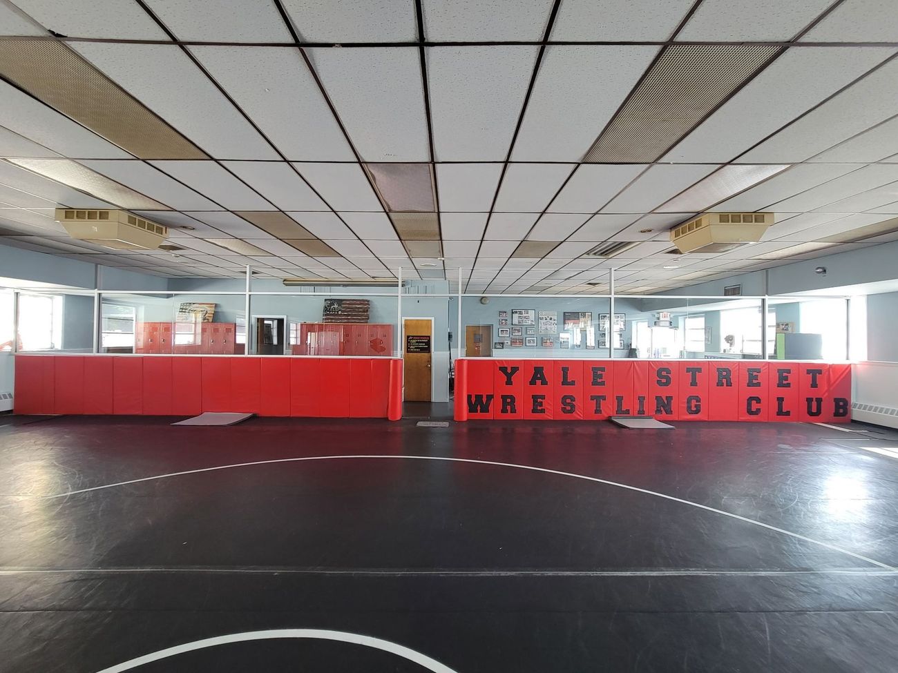 The yale street wrestling club is located in a large room
