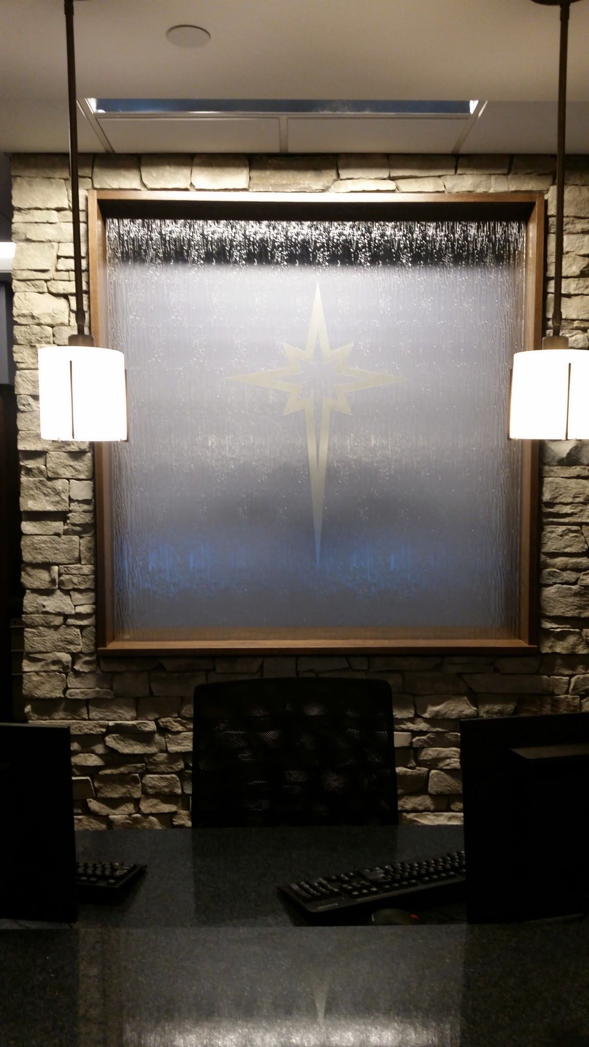 A conference room with a large picture on the wall