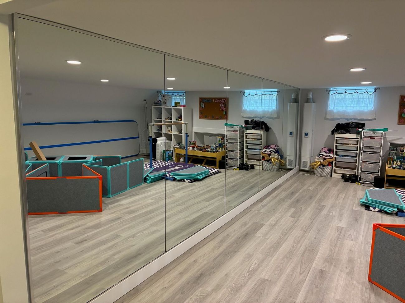 There is a large mirror in the middle of the room.