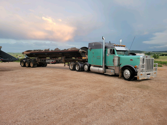 Red cargo truck — Black Hawk, SD — Bennett Transportation