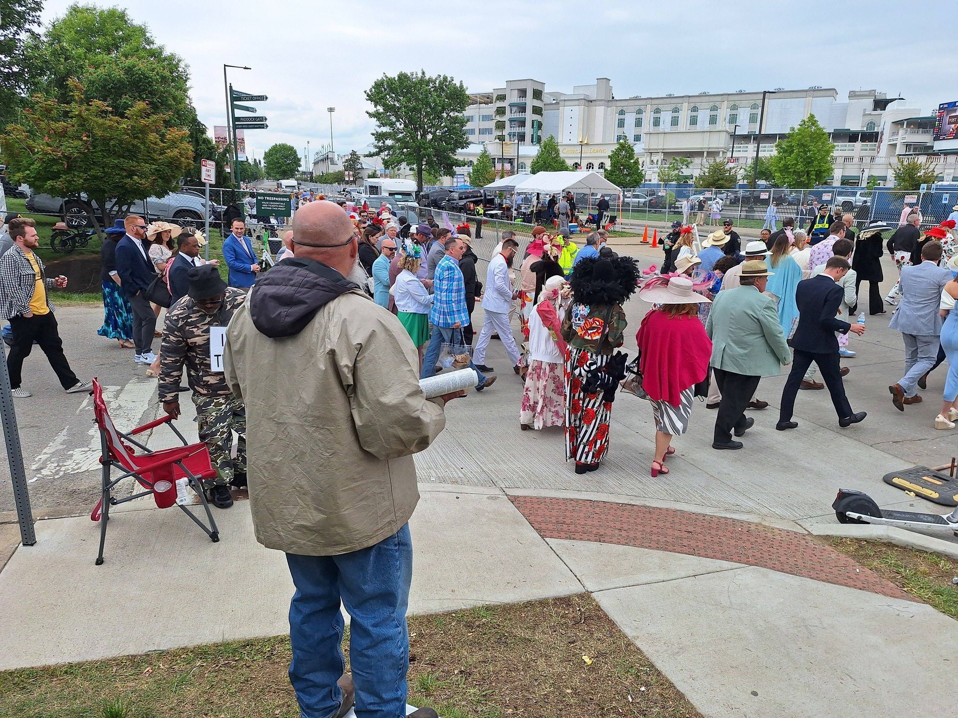 An SFOI evangelist reading Scripture to the crowds at the Kentucky Derby — tens of thousands of people, and far fewer hecklers than you would expect.