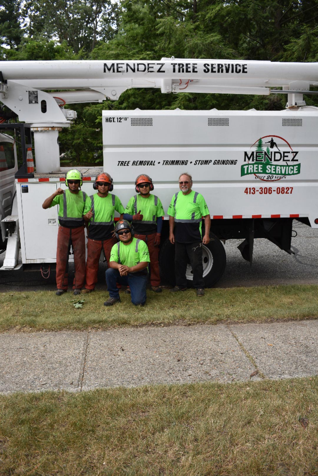 Men Beside The Truck — Springfield, MA — Mendez Tree Service LLC