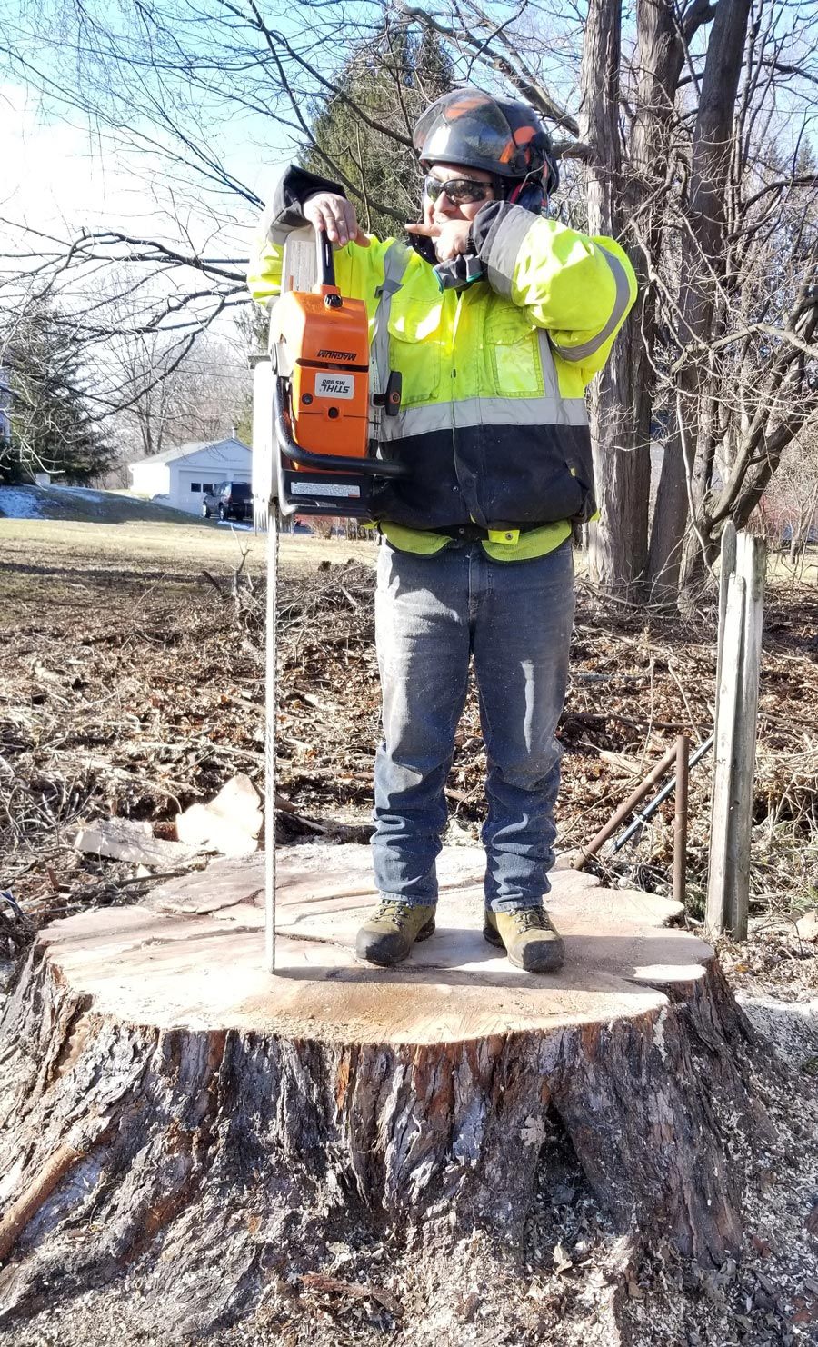 Man Holding Large Chainsaw — Springfield, MA — Mendez Tree Service LLC