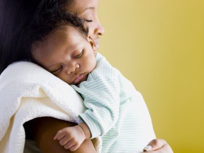 Mom holding son