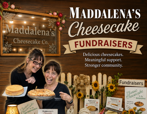 Two women are standing next to a wooden sign that says fundraisers.