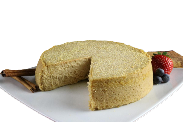A cake with a slice taken out of it on a white plate