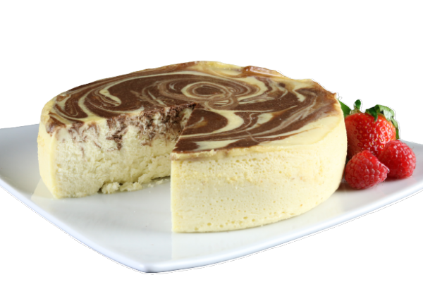 A cheesecake with strawberries on a white plate