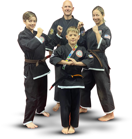 a group of children are practicing martial arts together .