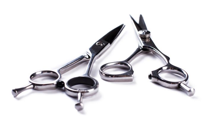 Two scissors lying next to each other