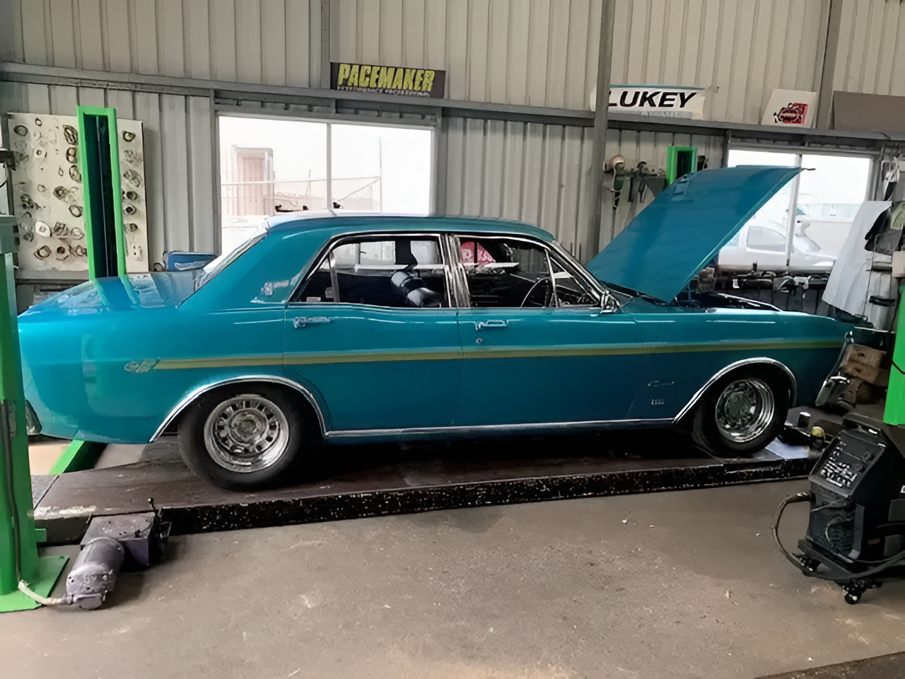Blue Classic Car in a Repair Shop — Gladstone Mufflers & Suspension In Gladstone Central, QLD
