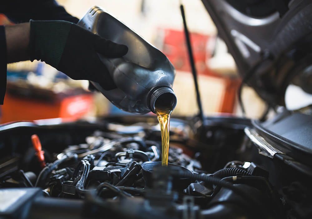 Oil Being Poured Into Motor