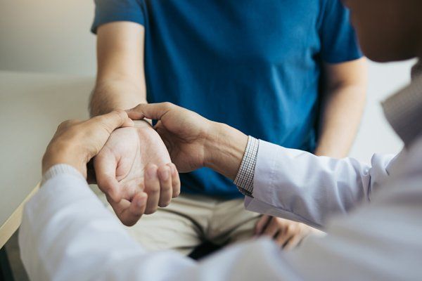 Wrist Adjustment — Superior, WI — Kintop Chiropractic & Wellness Clinic Wrist Adjustment — Superior, WI — Kintop Chiropractic & Wellness Clinic