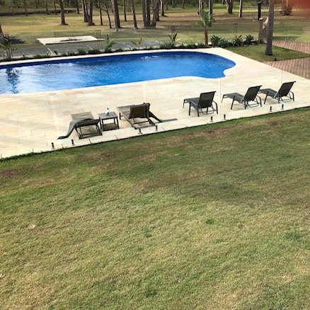 Large Grassy Backyard with Pool — Penguin Pools in Gold Coast, QLD