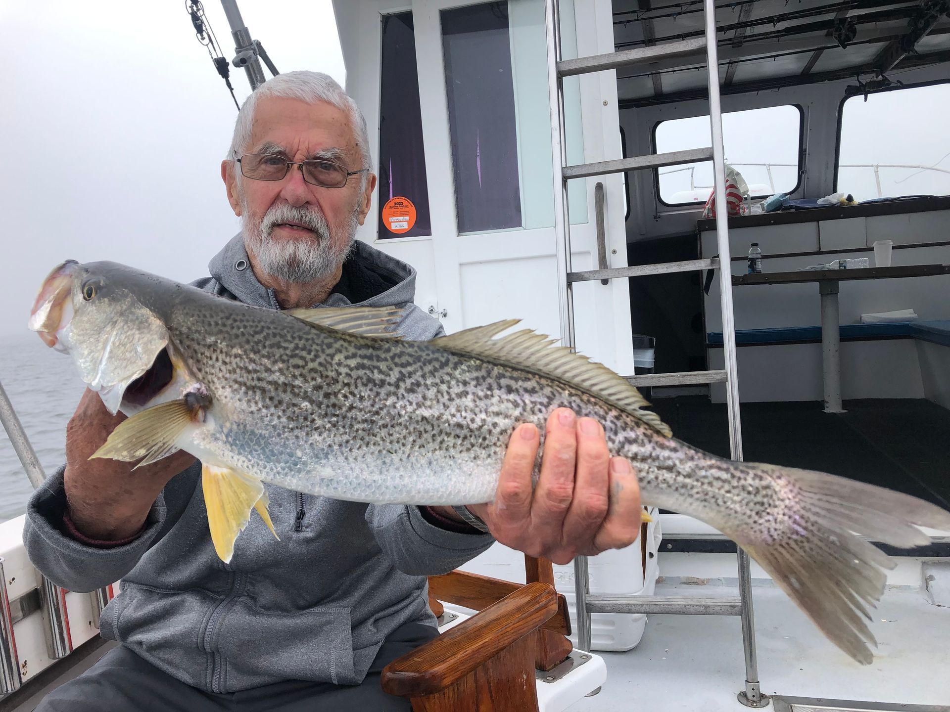 man holding fish
