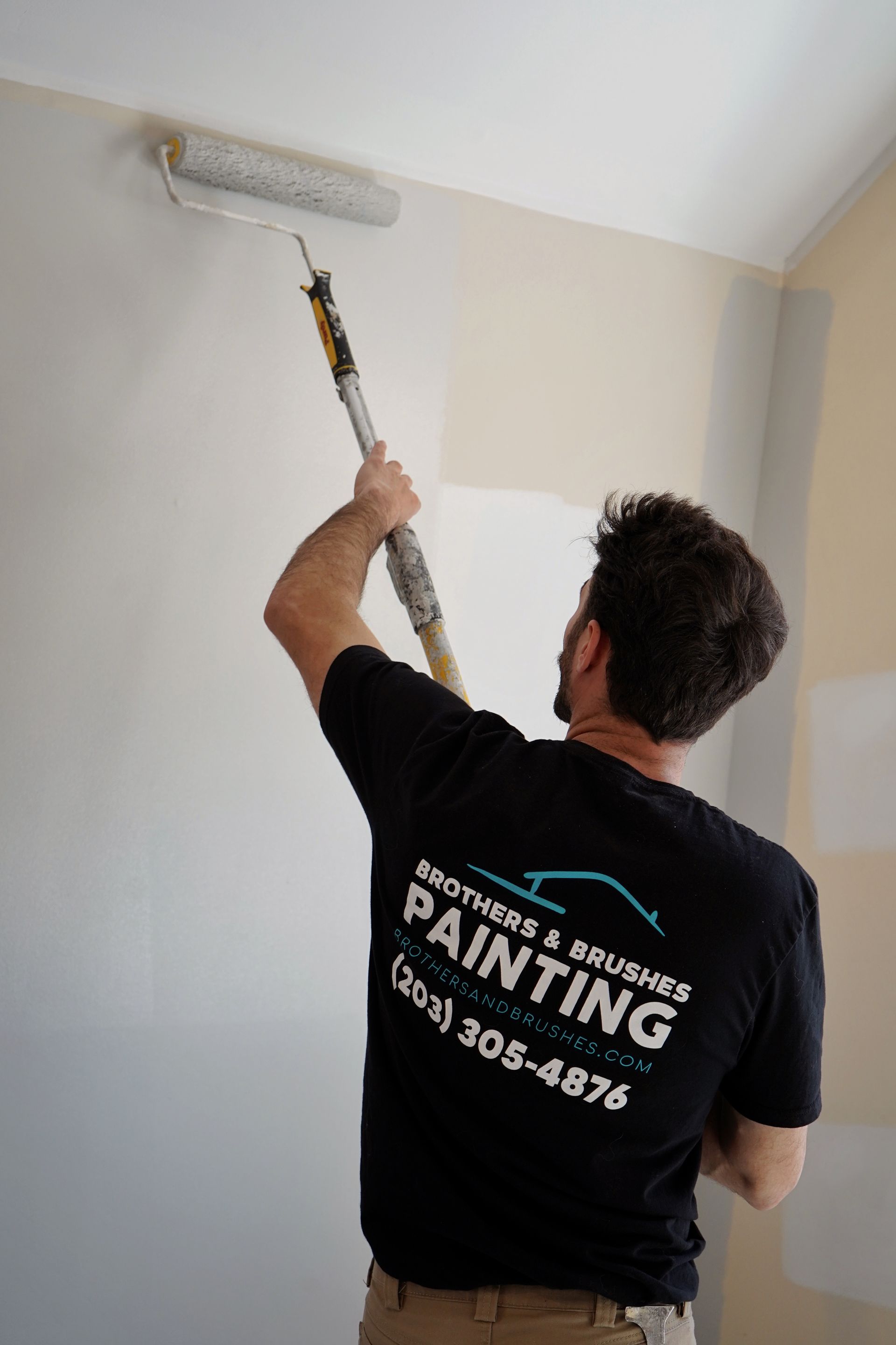 A painter in a black