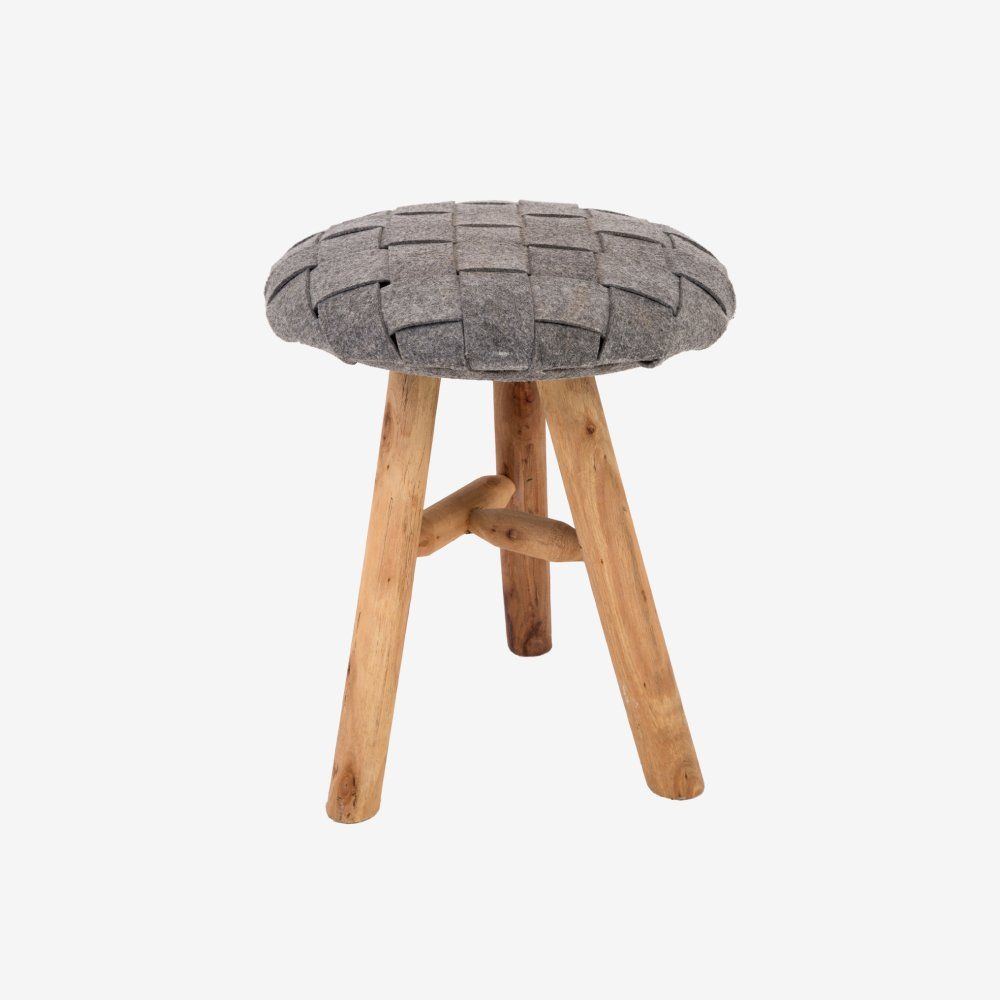 A small, three-legged wooden stool with a round seat made of woven grey felt strips against a white background.
