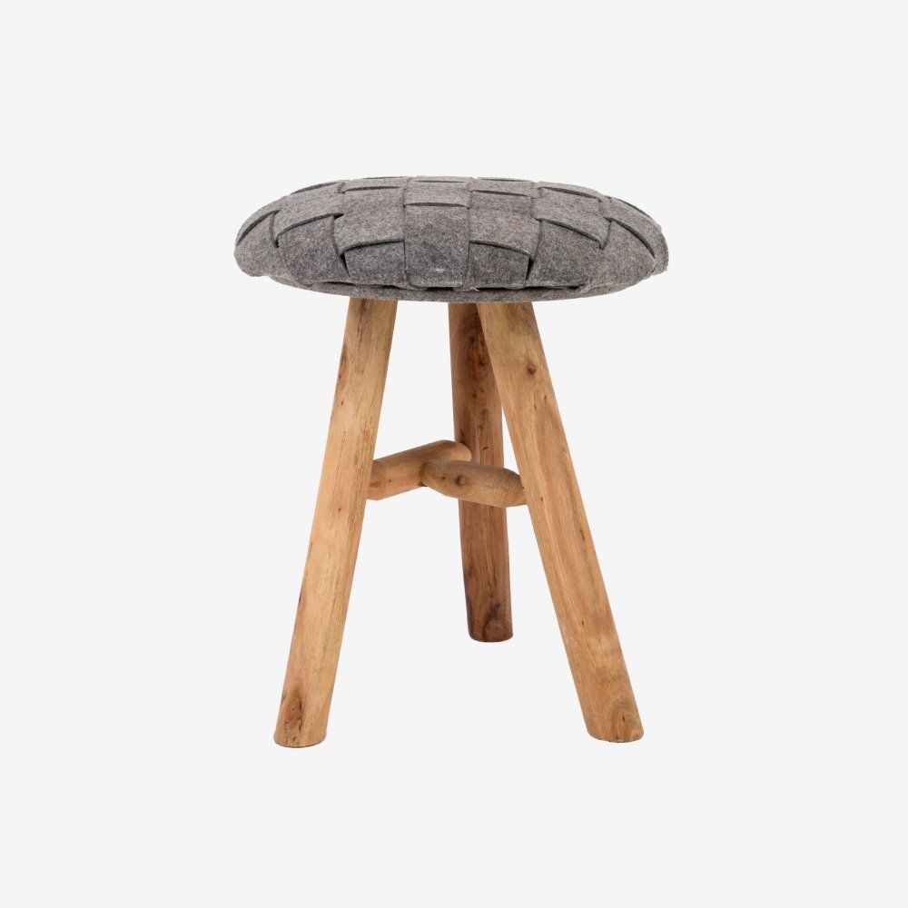 A small, three-legged wooden stool with a round seat made of woven grey felt strips against a white background.