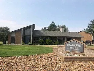 Hawthorne House monument sign and building exterior