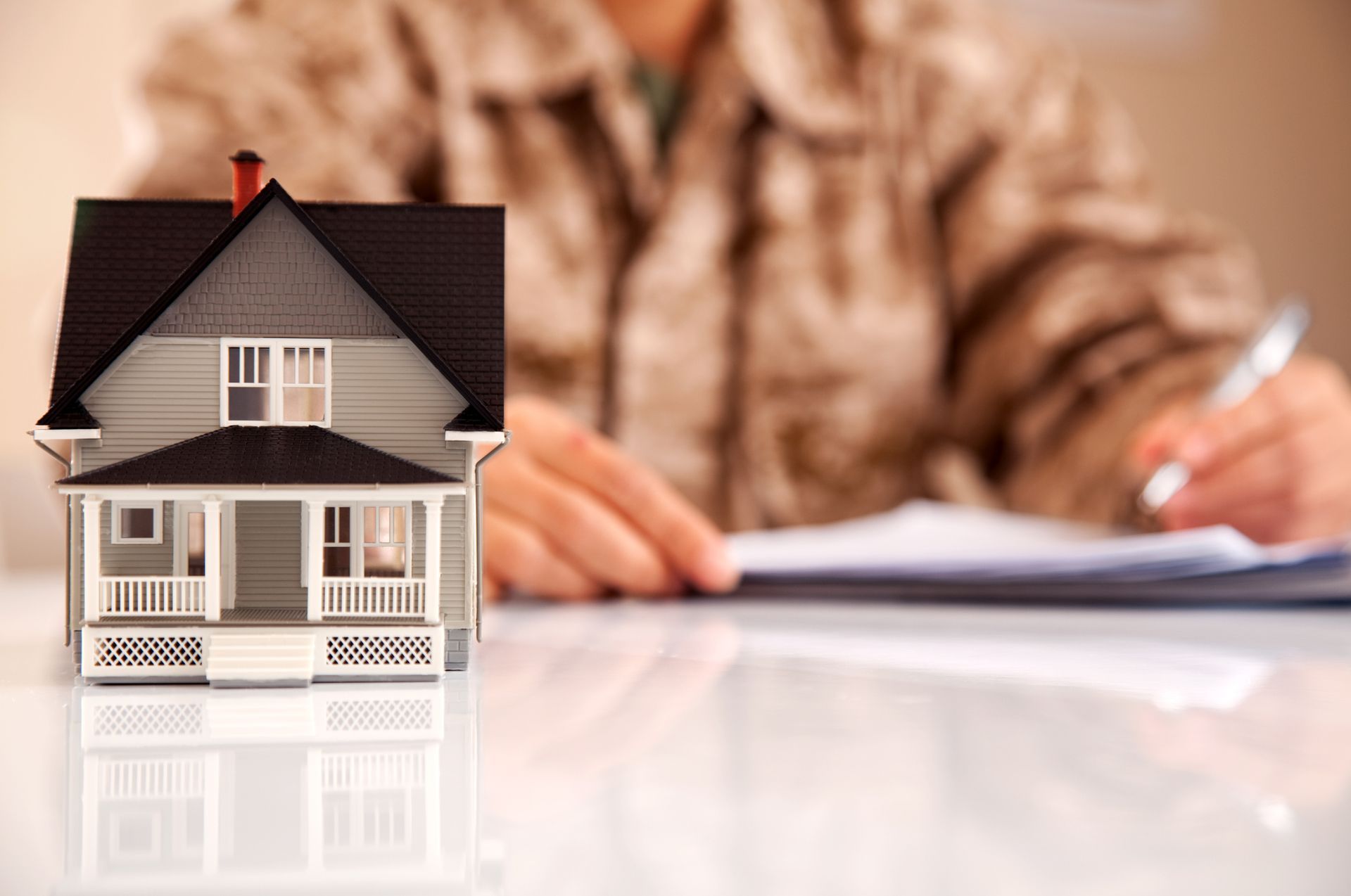 Service member wearing marines uniform filling real estate related paperwork – Dayton, OH - C & G Mortgage Service member wearing marines uniform filling real estate related paperwork – Dayton, OH - C & G Mortgage