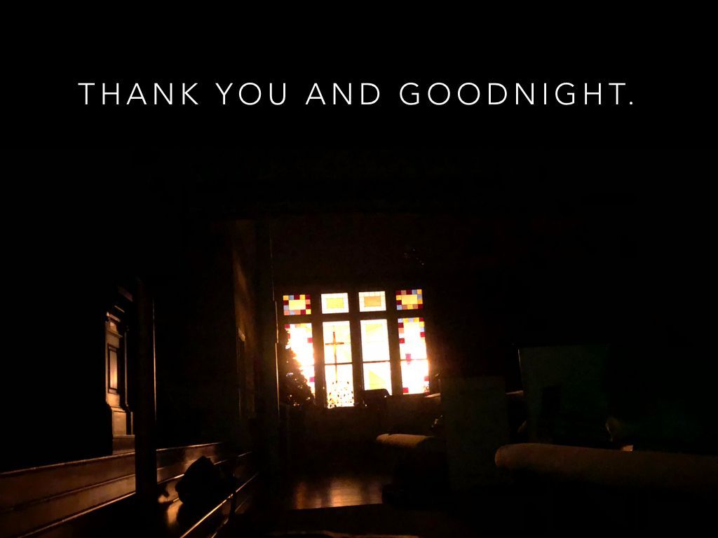 A dark room with a window and the words thank you and goodnight