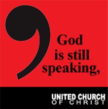 A red sign that says god is still speaking