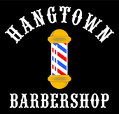 White bison silhouette with a barber's razor, encircled by white, 